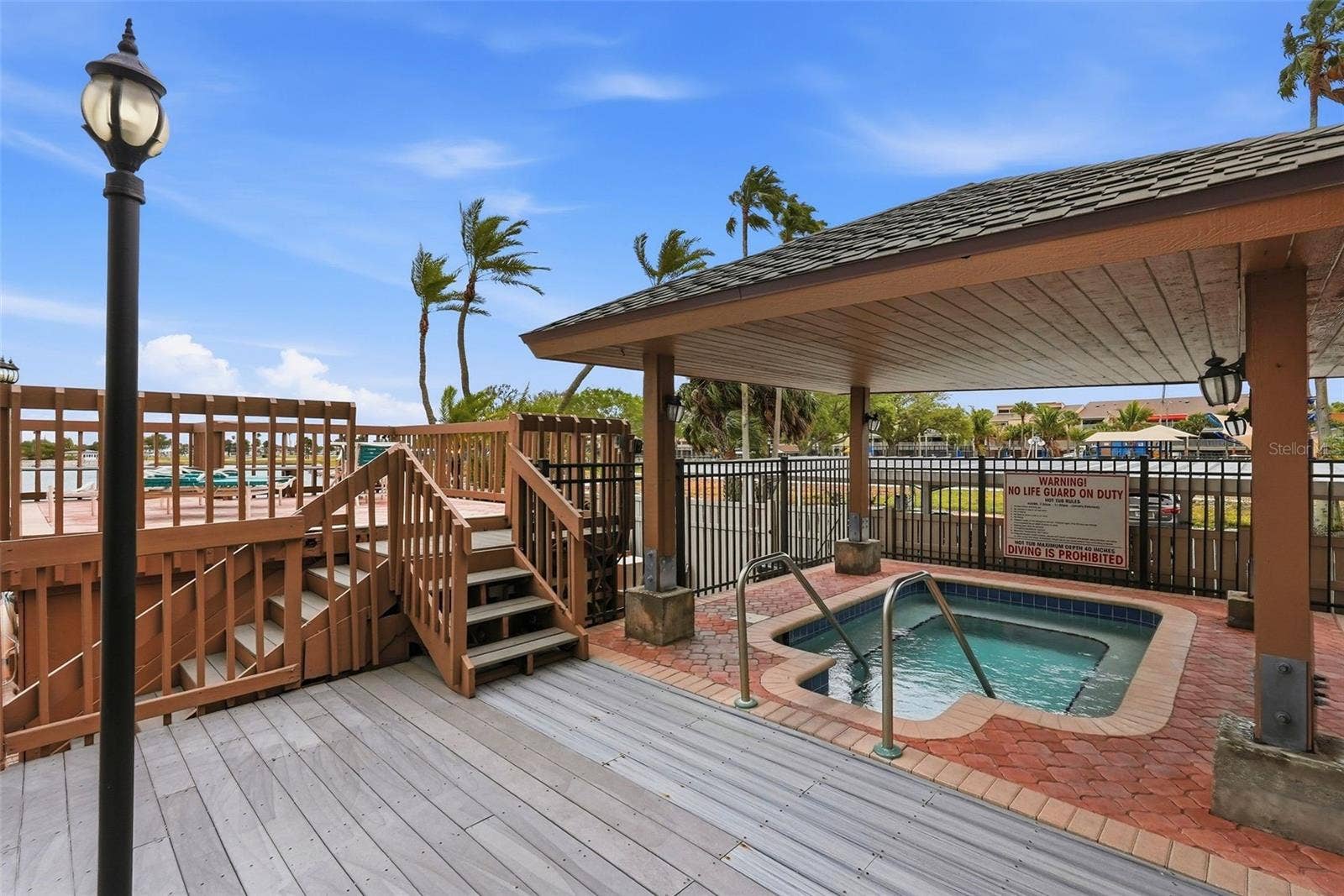 10355 PARADISE BOULEVARD, #608, Treasure Island, FL 33706 Spa area and sunning deck