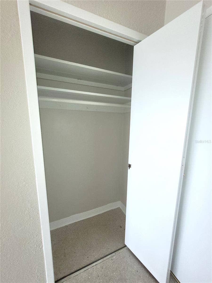 10355 PARADISE BOULEVARD, #608, Treasure Island, FL 33706 Entryway coat/storage closet