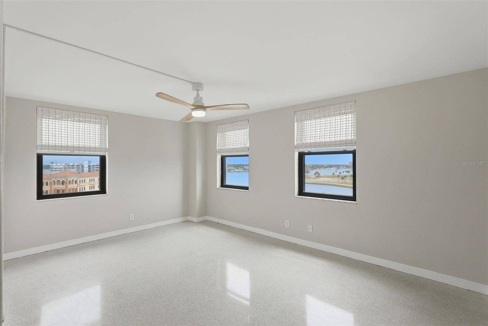 10355 PARADISE BOULEVARD, #608, Treasure Island, FL 33706 Primary bedroom 3 windows - natural light and extra views to the East and Northwest