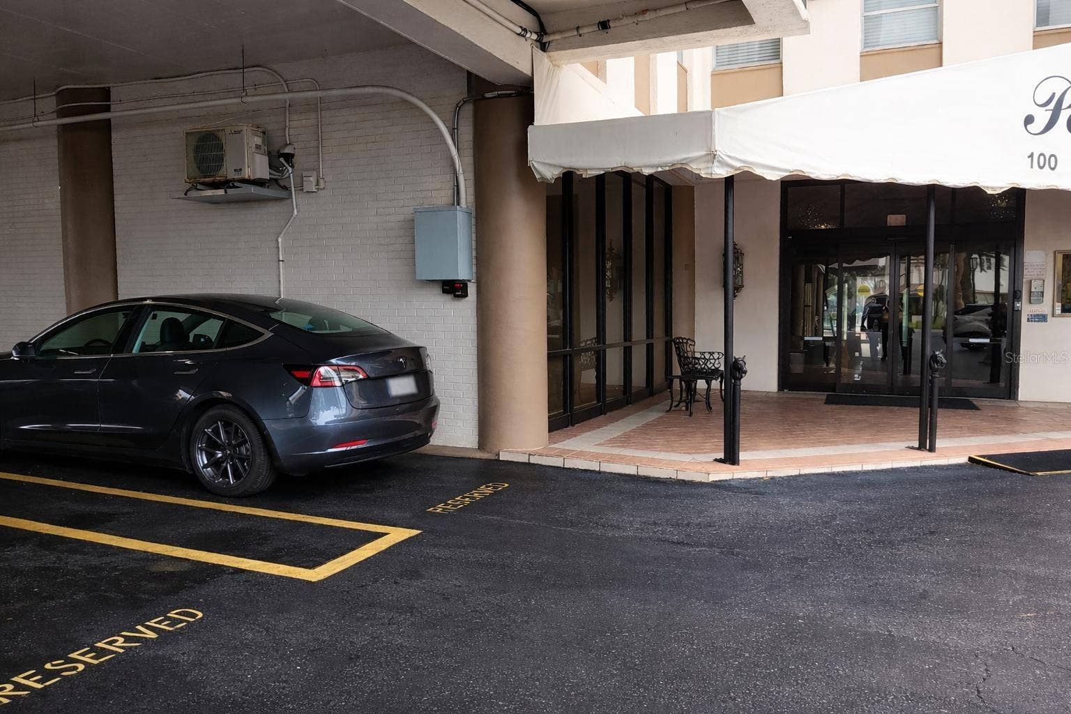 10355 PARADISE BOULEVARD, #608, Treasure Island, FL 33706 Parking for 608 right at the entrance