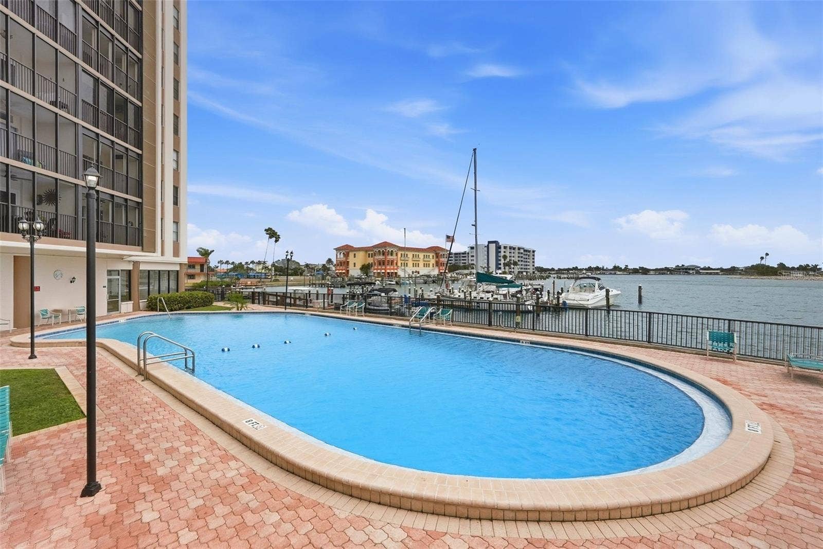 10355 PARADISE BOULEVARD, #608, Treasure Island, FL 33706 Large pool patio area overlooking the water