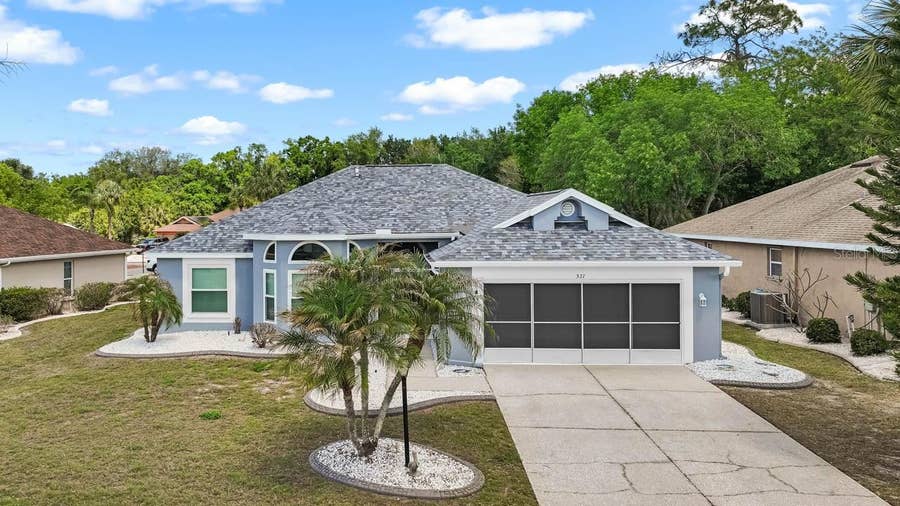 Property photo for 327 CALOOSA WOODS LANE, Sun City Center, FL
