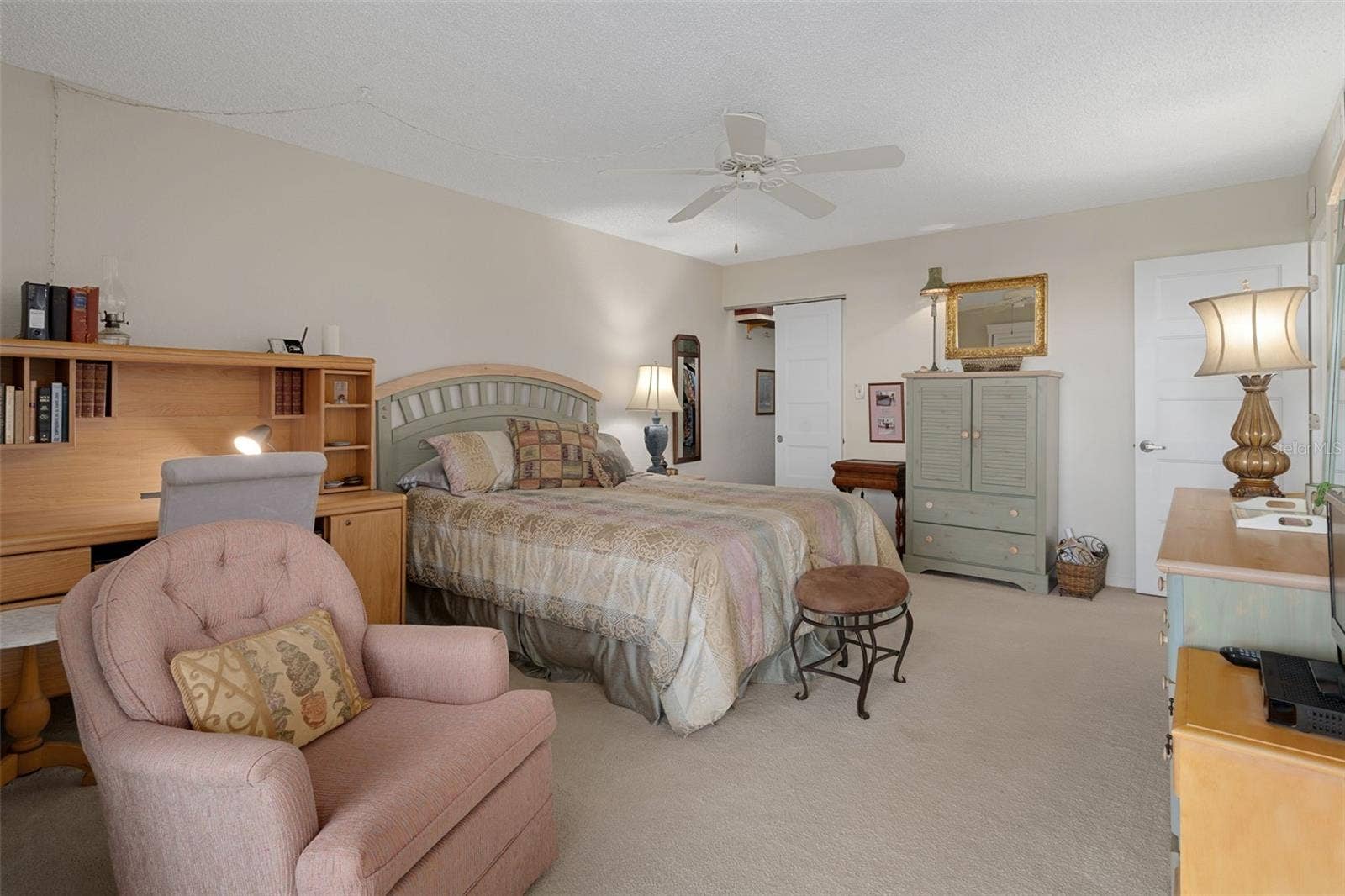 1230 GULF BOULEVARD, #303, Clearwater Beach, FL 33767 Primary bedroom offers a walk-in closet and an en-suite bathroom for added convenience