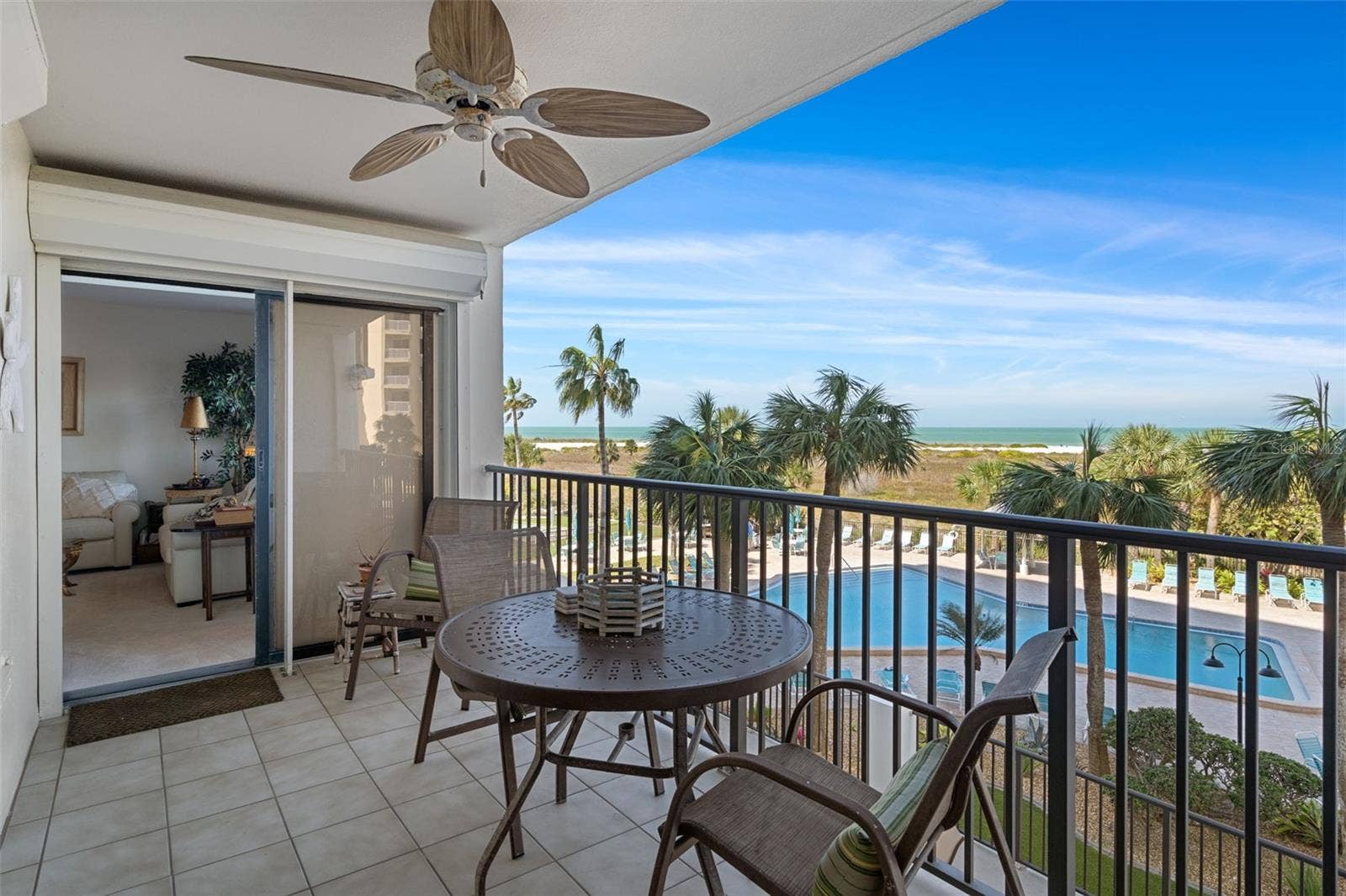 1230 GULF BOULEVARD, #303, Clearwater Beach, FL 33767 Entrance to patio from living room. Great views from every angle!