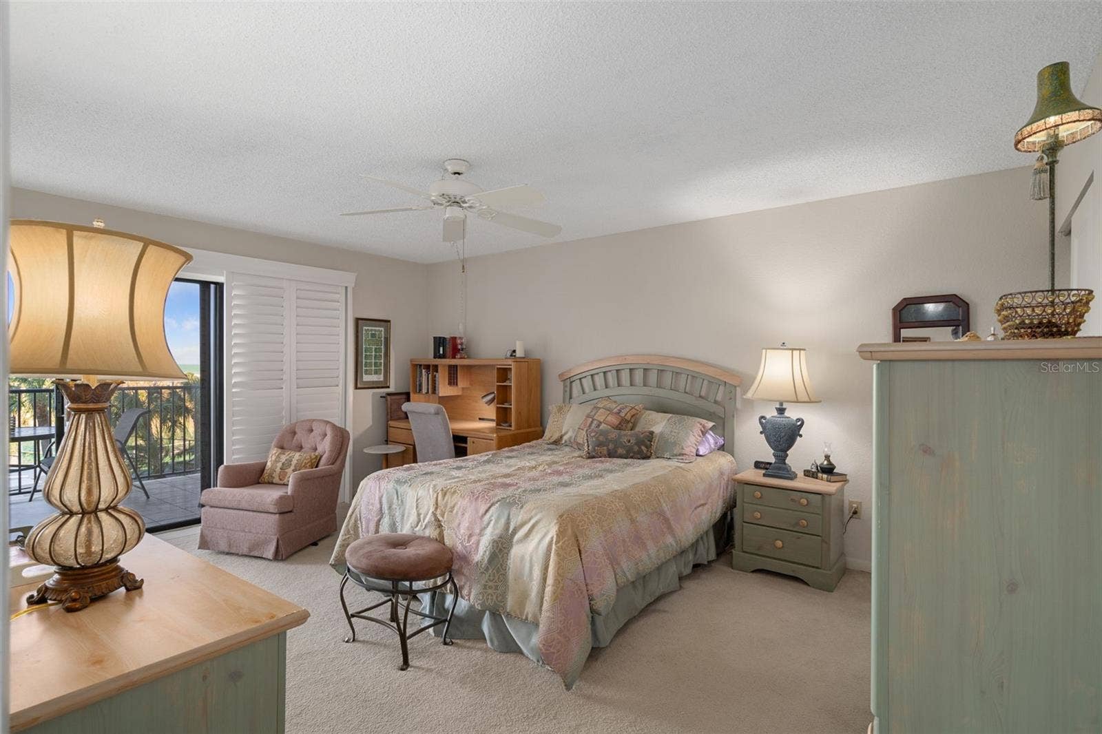 1230 GULF BOULEVARD, #303, Clearwater Beach, FL 33767 Primary bedroom features sliders to the patio & overlooks the beach