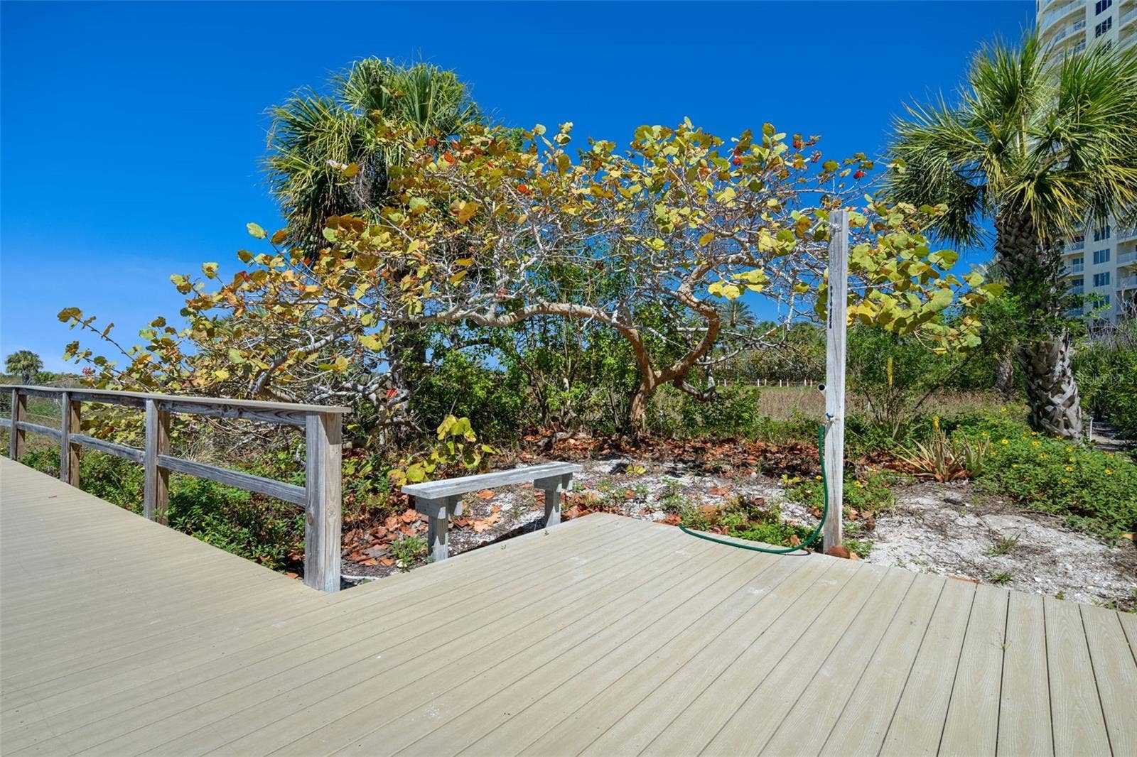 1230 GULF BOULEVARD, #303, Clearwater Beach, FL 33767 Convenient shower to rinse the sand and salt water off before entering the pool area