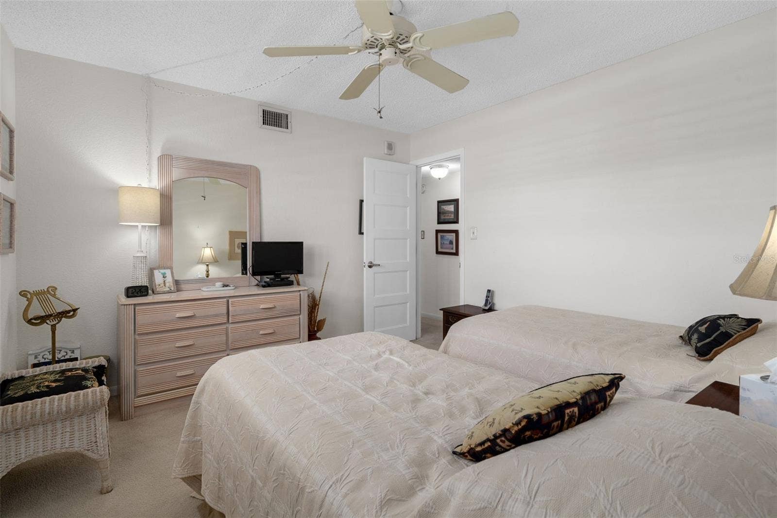 1230 GULF BOULEVARD, #303, Clearwater Beach, FL 33767 Bedroom 2 is equipped with twin beds for overnight guests