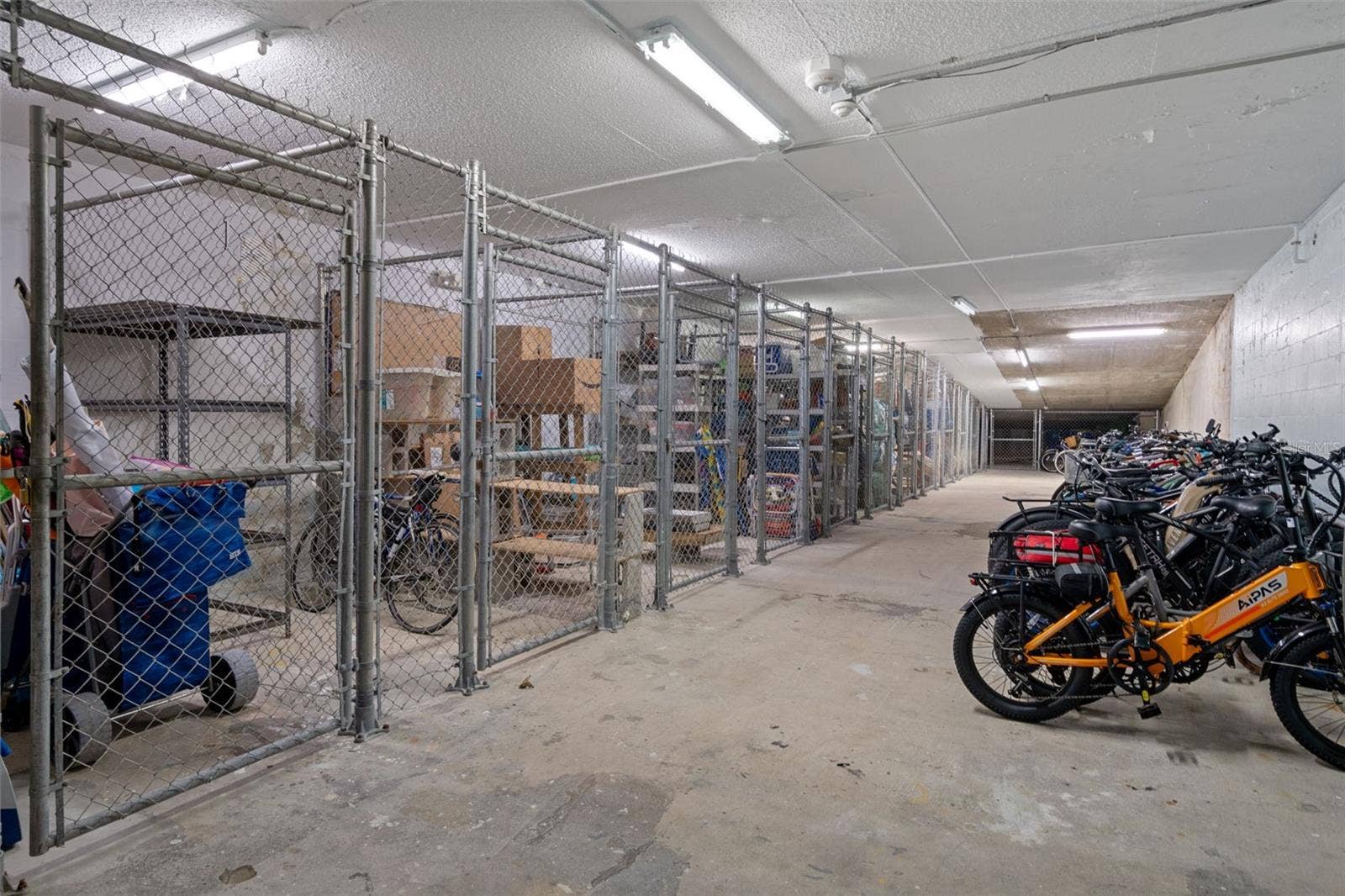 1230 GULF BOULEVARD, #303, Clearwater Beach, FL 33767 Enclosed Community Storage Area features secure cages for a fee (waiting list) as well as open bike and board storage.
