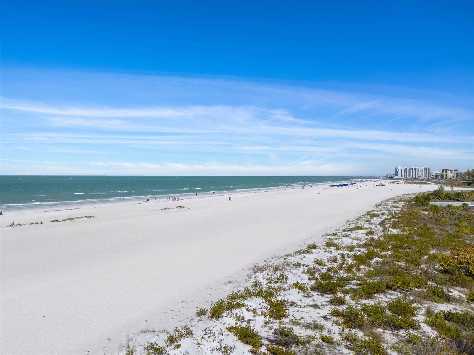 1230 GULF BOULEVARD, #303, Clearwater Beach, FL 33767 View to the north. Just past the boat channel is Clearwater Beach. Sand Key features mostly residents and is less crowded than the more commercialized Clearwater Beach.