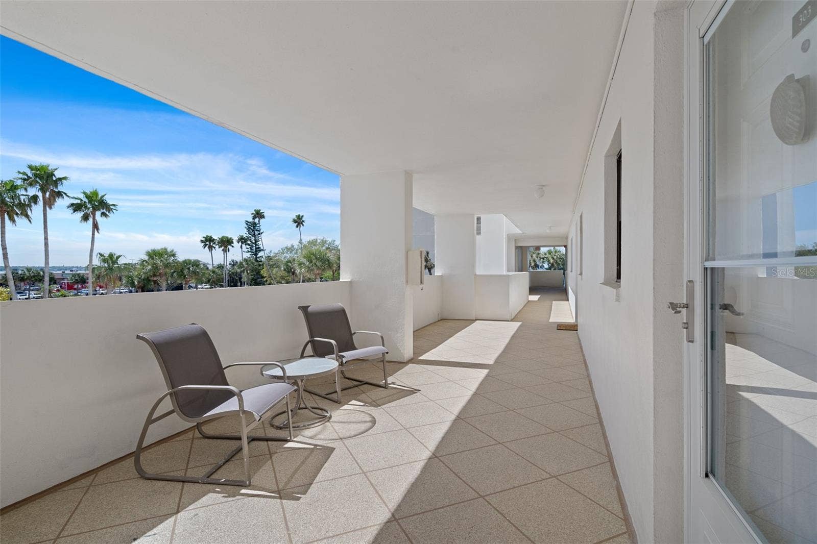 1230 GULF BOULEVARD, #303, Clearwater Beach, FL 33767 Covered breezeway to units