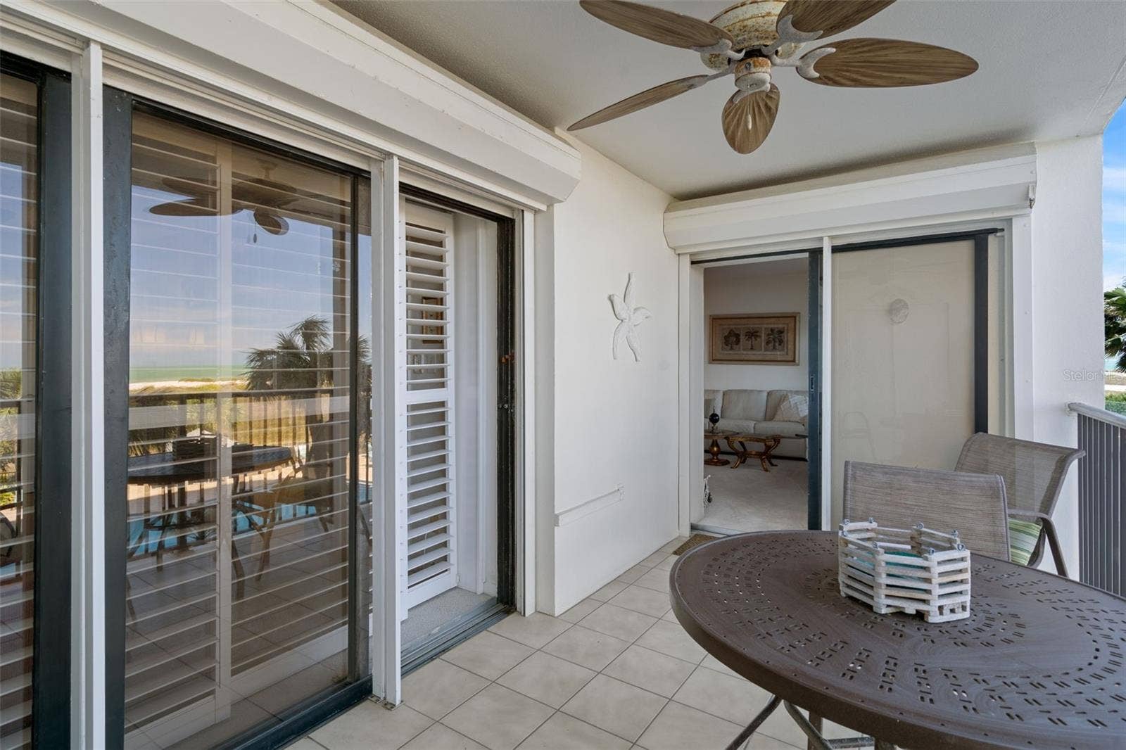 1230 GULF BOULEVARD, #303, Clearwater Beach, FL 33767 Hurricane shutters over both sliding doors for added peace of mind when needed!