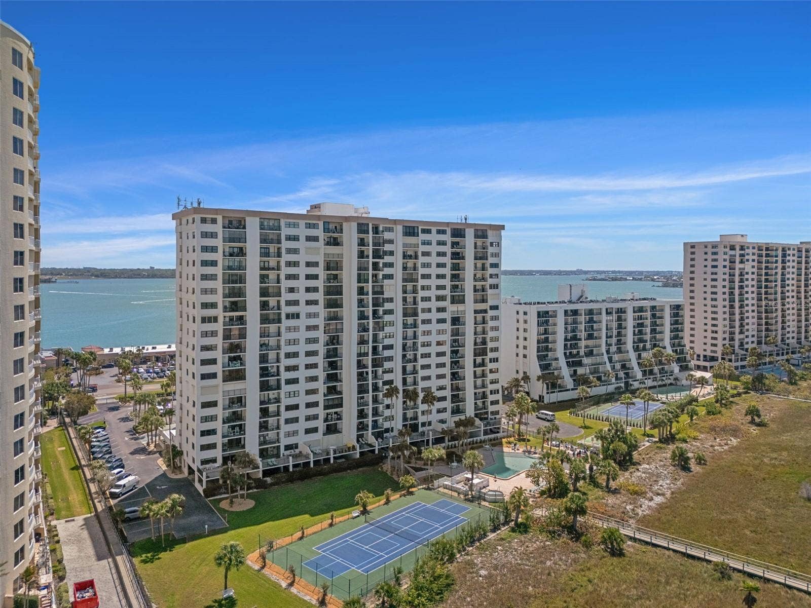 1230 GULF BOULEVARD, #303, Clearwater Beach, FL 33767 Landmark Tower One features a pool, spa, tennis & pickleball courts, a swing set and a boardwalk to the sugar sand beach!