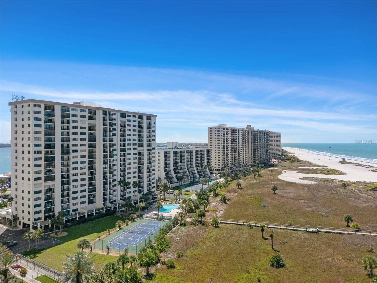 1230 GULF BOULEVARD, #303, Clearwater Beach, FL 33767 View of property looking north to south down the beach