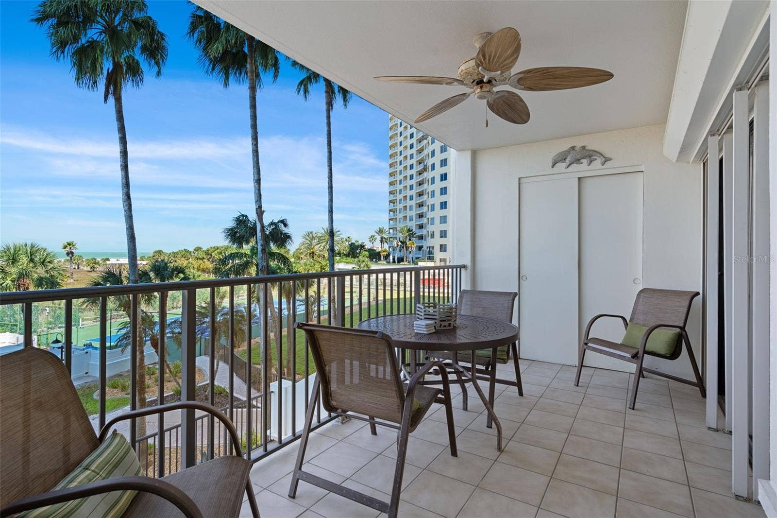 1230 GULF BOULEVARD, #303, Clearwater Beach, FL 33767 Spacious covered patio for enjoying the fresh air, salty breezes and beautiful views. Storage closet for beach chairs and pool floatys!