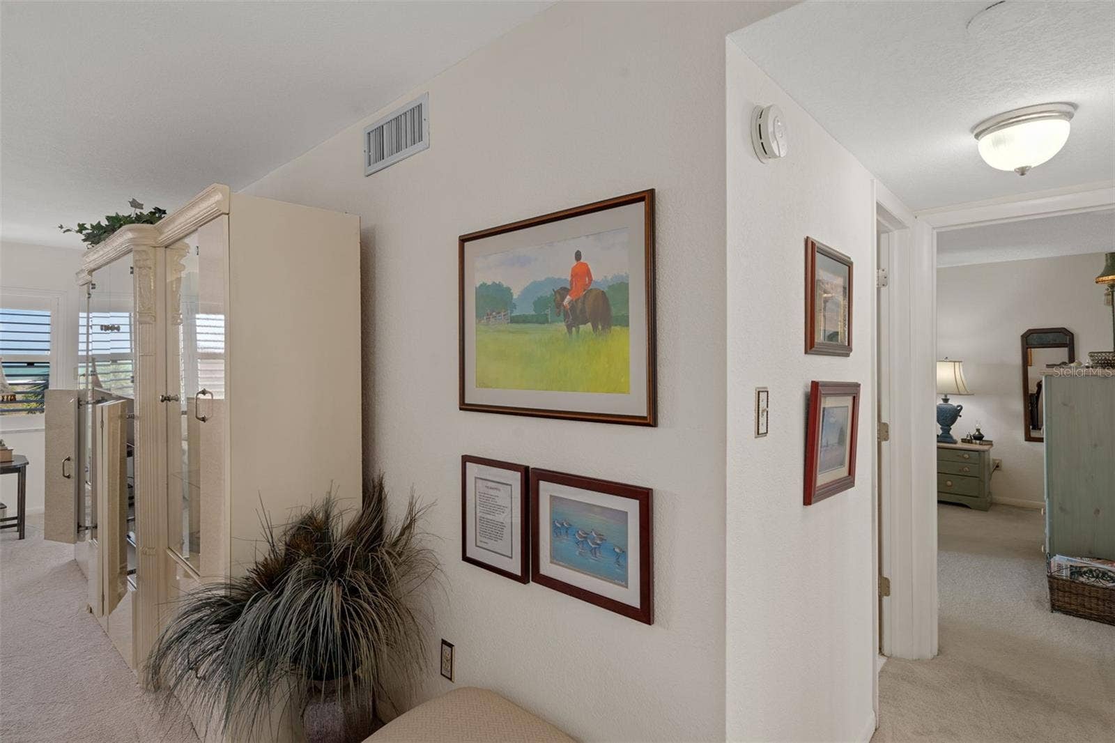 1230 GULF BOULEVARD, #303, Clearwater Beach, FL 33767 Hallway to bedrooms & bathrooms is adjacent to dining area