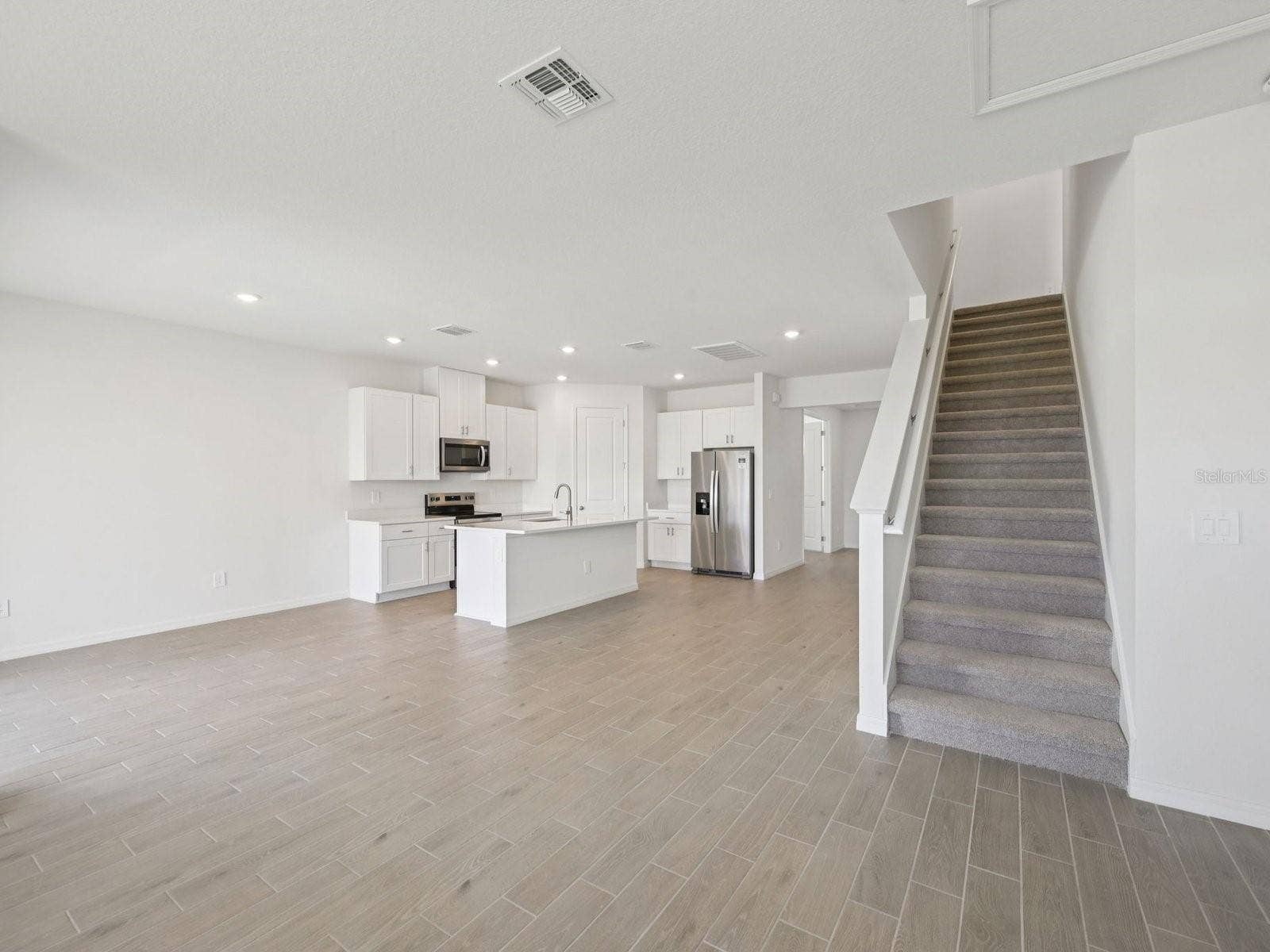 9009 VENETIA COURT, Palmetto, FL 34221 Interior photos are not of the actual home but are photos of the builder home with the same floorplan with similar interior finishes and features.