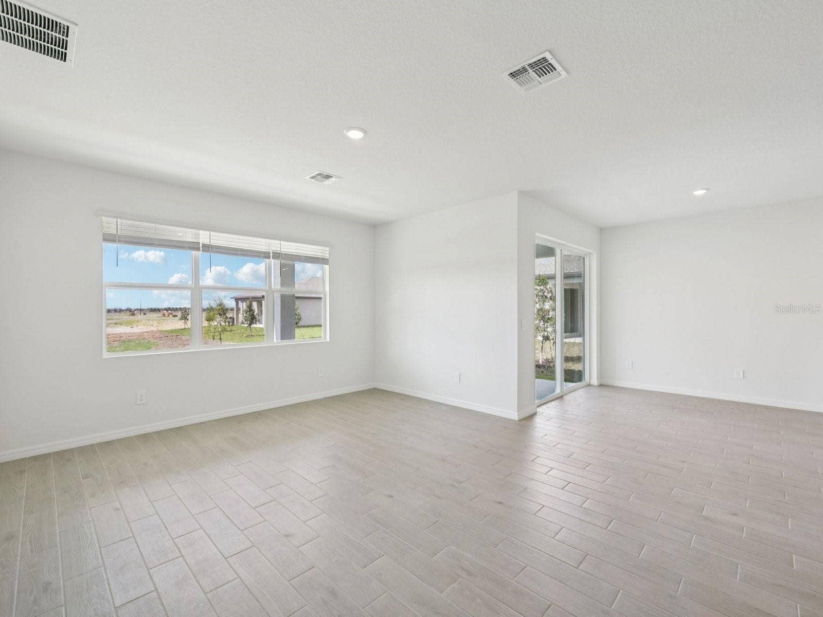 9009 VENETIA COURT, Palmetto, FL 34221 Interior photos are not of the actual home but are photos of the builder home with the same floorplan with similar interior finishes and features.