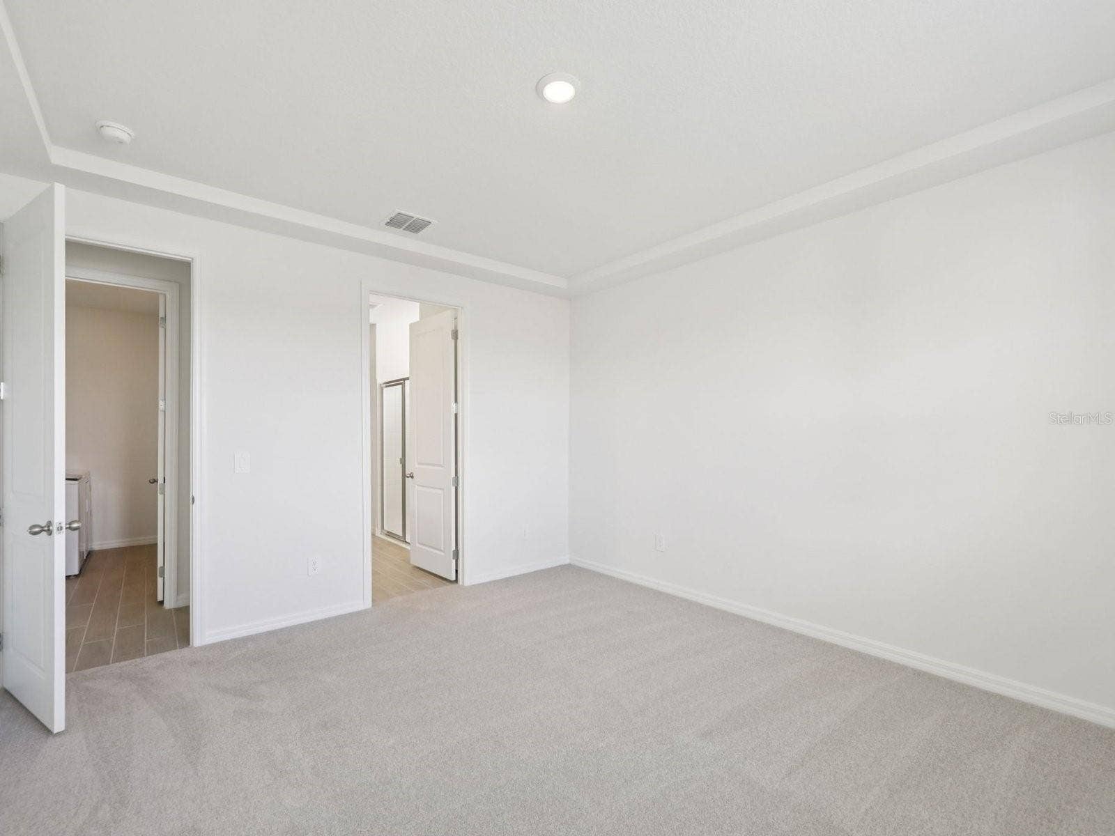 9009 VENETIA COURT, Palmetto, FL 34221 Interior photos are not of the actual home but are photos of the builder home with the same floorplan with similar interior finishes and features.