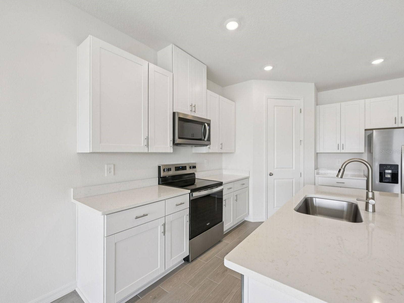 9009 VENETIA COURT, Palmetto, FL 34221 Interior photos are not of the actual home but are photos of the builder home with the same floorplan with similar interior finishes and features.