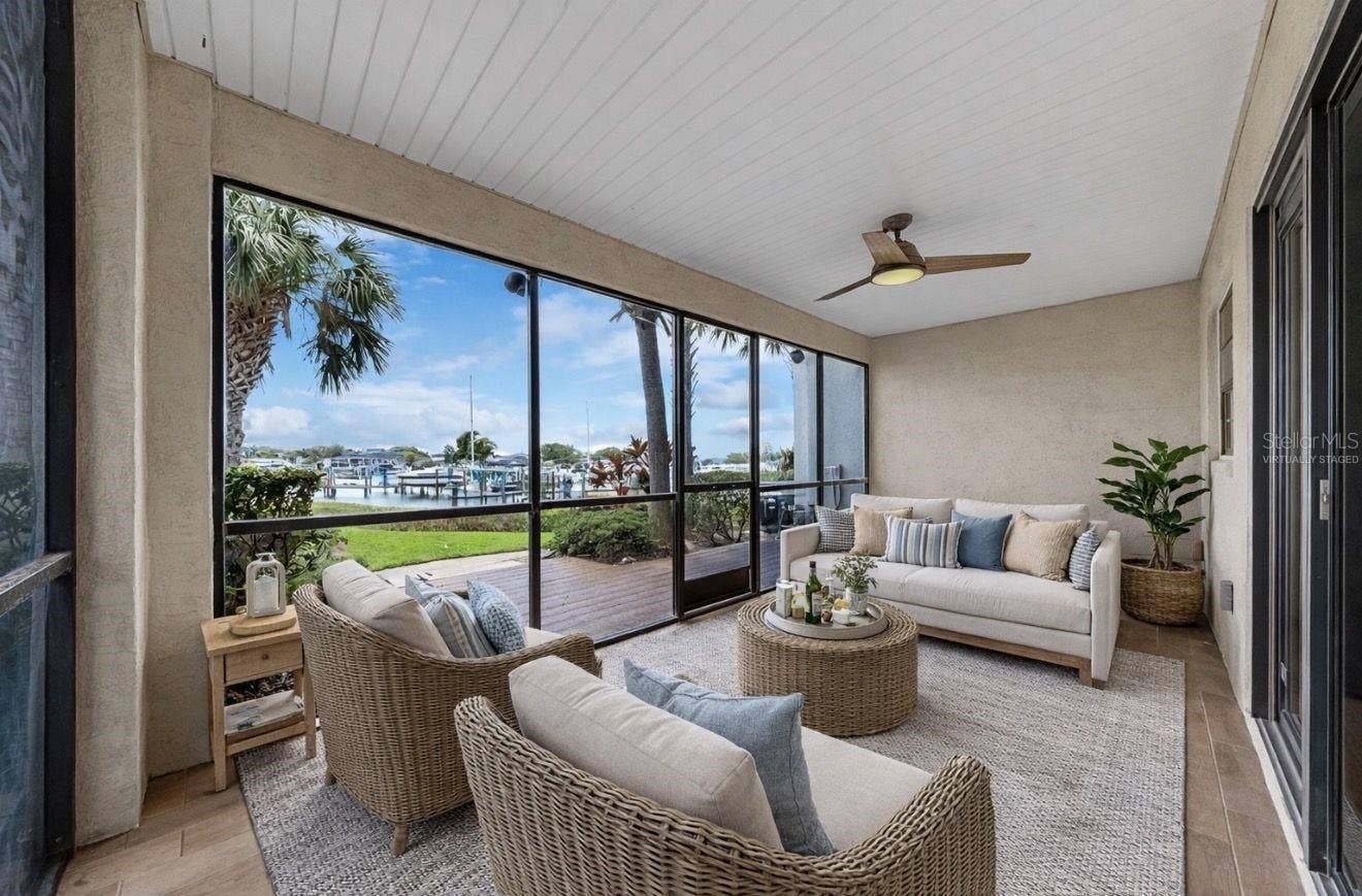 626 YARDARM DRIVE, #13, Apollo Beach, FL 33572 Downstairs Covered Lanai Virtually Staged