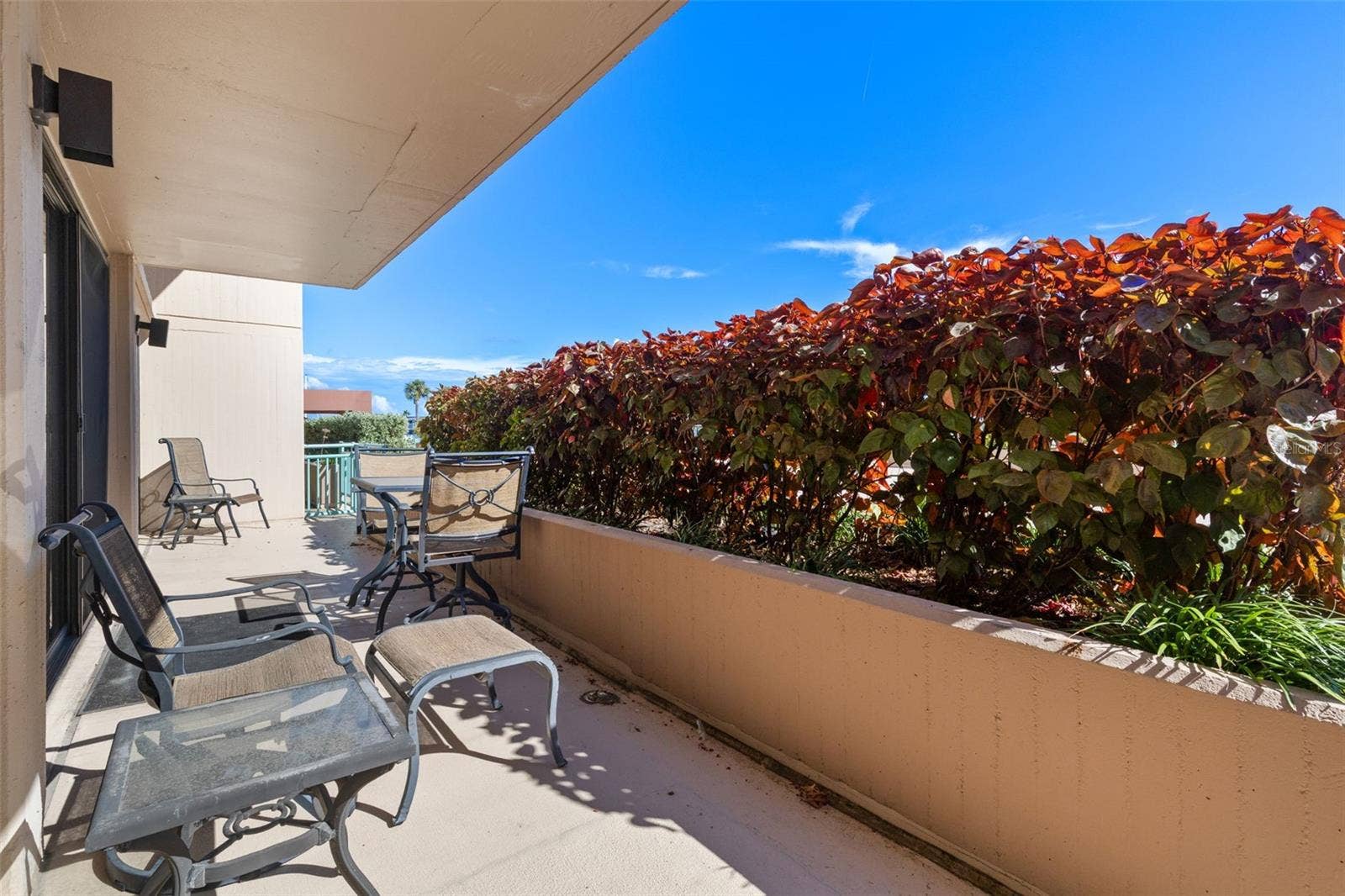 1 KEY CAPRI, #102E, Treasure Island, FL 33706 Your PRIVATE Terrace spans BOTH Bedrooms AND the Living Room - 35' long PLUS