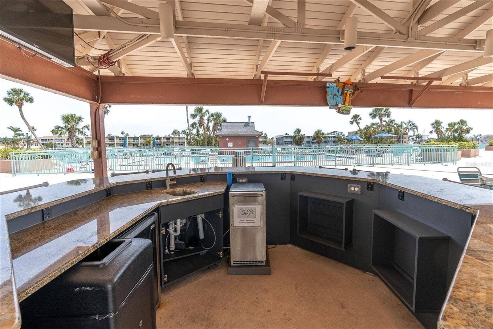 1 KEY CAPRI, #102E, Treasure Island, FL 33706 Self Serve Tike Bar, with ICE MAKER, water and electric outlets. POOL Views here