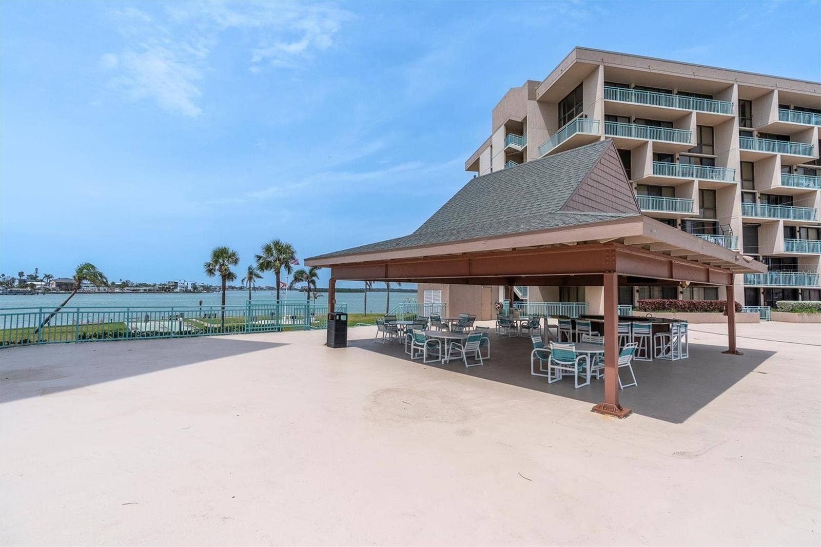 1 KEY CAPRI, #102E, Treasure Island, FL 33706 Tiki Hut with icemaker, water and wetbar... cool SHADE and Al Fresco Dining Options around the Plaza Deck ... POOL and SPA area adjacent... ALL IMMEDIATELY ACCESSIBLE from your Private TERRACE / Balcony