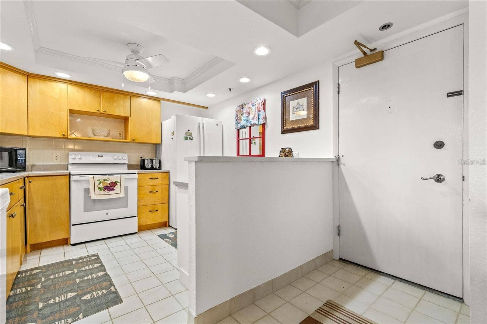 1 KEY CAPRI, #104-East, Treasure Island, FL 33706