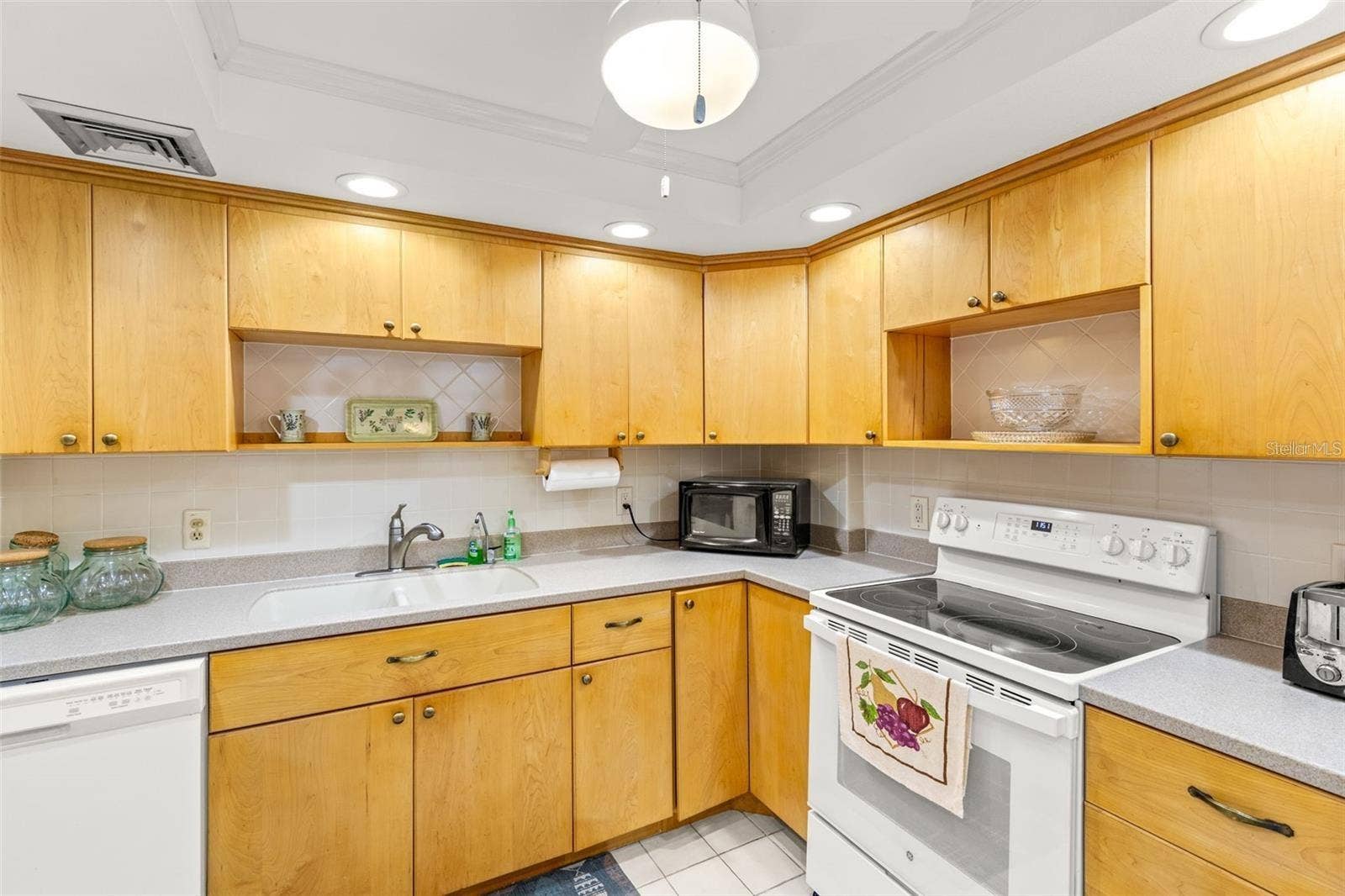 1 KEY CAPRI, #104-East, Treasure Island, FL 33706