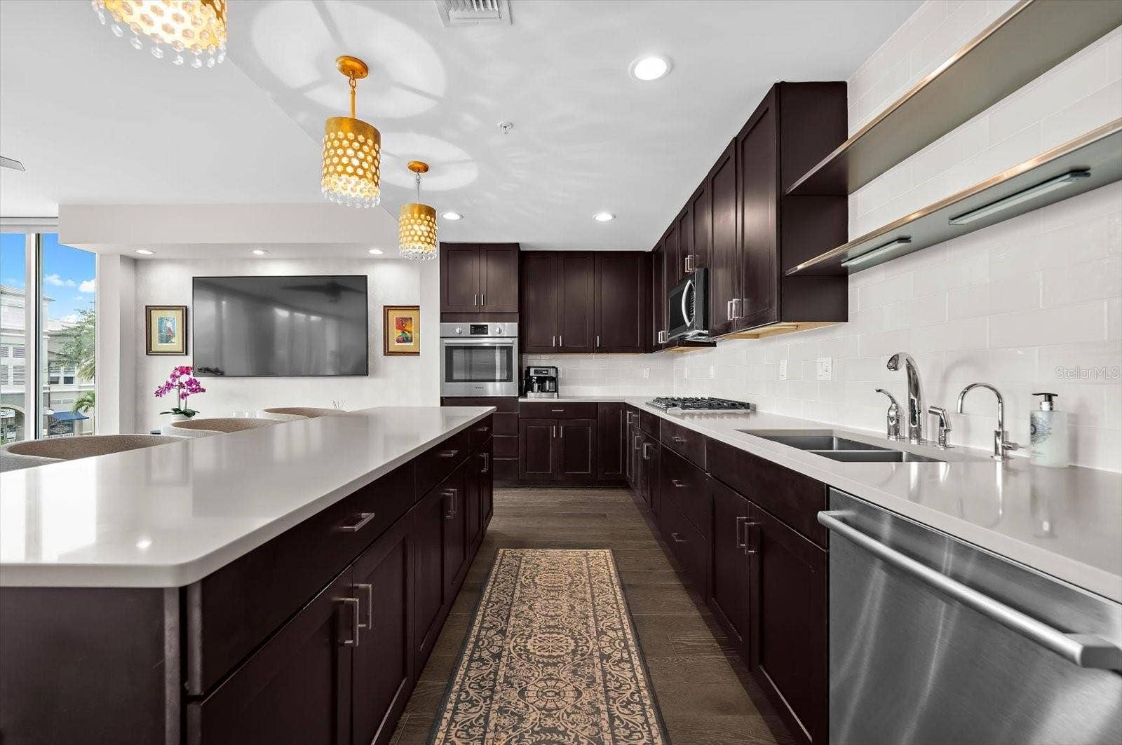 176 4TH AVENUE NE, #201, St Petersburg, FL 33701 Kitchen and Living Room