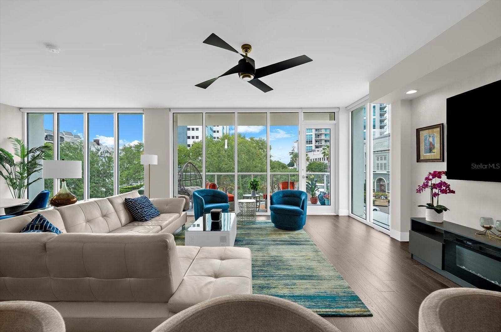 176 4TH AVENUE NE, #201, St Petersburg, FL 33701 Living Room Area with Balcony