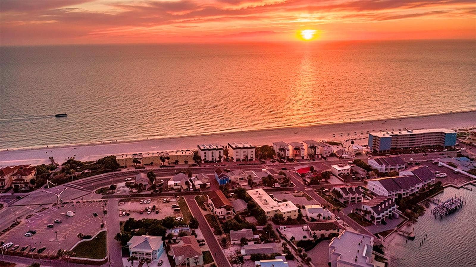 148 98TH AVENUE, Treasure Island, FL 33706 Enjoy epic sunsets and water views to the east and west from 2nd 3rd and rooftop terrace levels of 2 unit