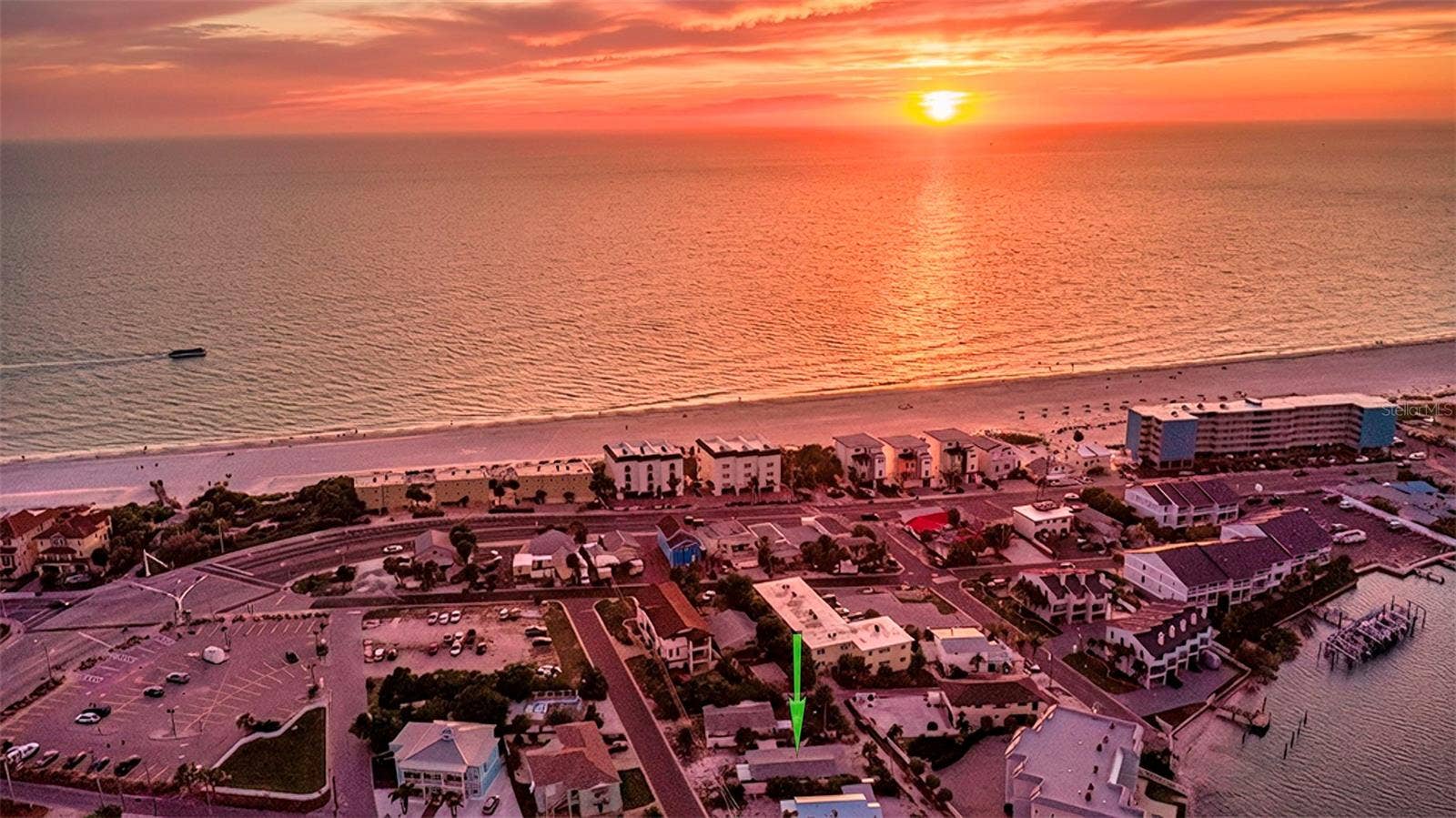 148 98TH AVENUE, Treasure Island, FL 33706 Enjoy epic sunsets and water views to the east and west from 2nd 3rd and rooftop terrace levels of 2 unit
