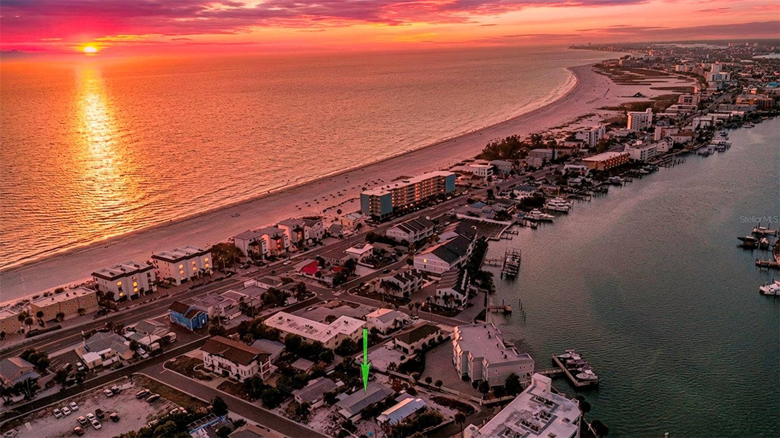 148 98TH AVENUE, Treasure Island, FL 33706 Enjoy epic sunsets and water views to the east and west from 2nd 3rd and rooftop terrace levels of 2 unit