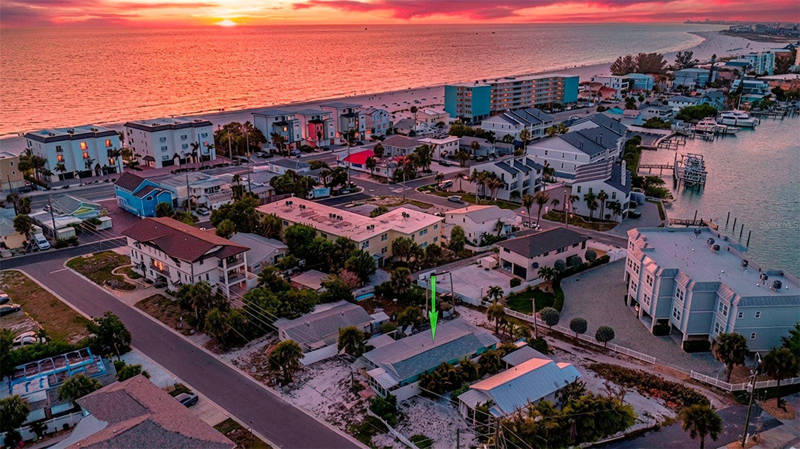 148 98TH AVENUE, Treasure Island, FL 33706 Enjoy epic sunsets and water views to the east and west from 2nd 3rd and rooftop terrace levels of 2 unit