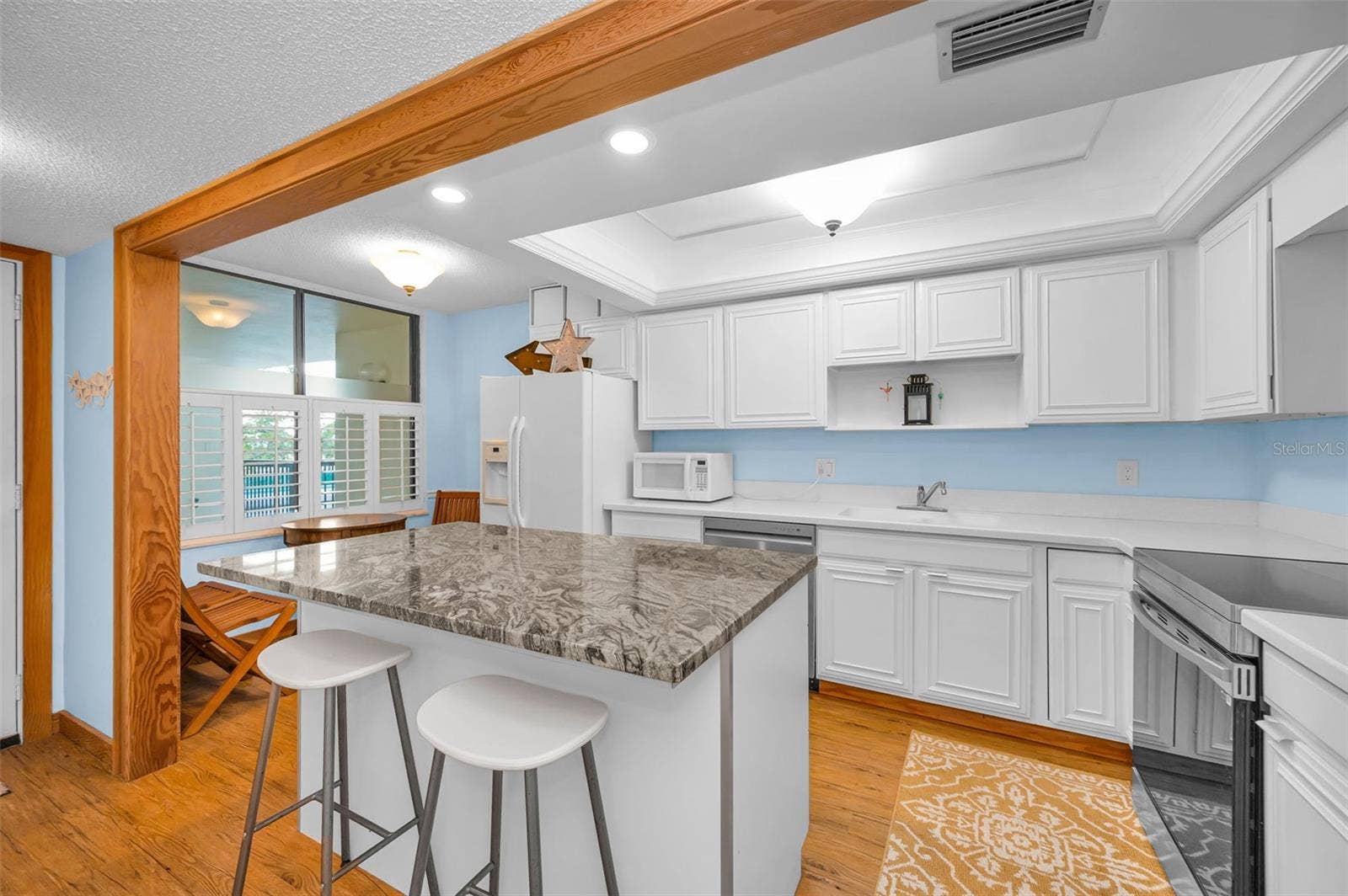 Social / Center Island that is perfect for the cook who doesn't want to be separated from friends and family
