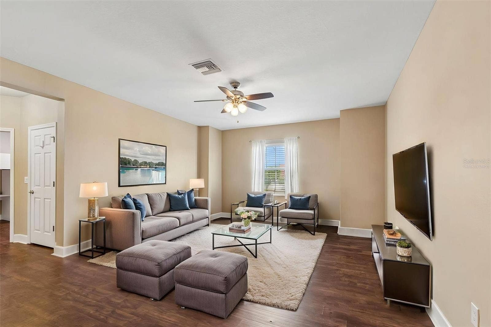 7090 88TH AVE N, Pinellas Park, FL 33782 Virtually staged:Upstairs, you'll find a large secondary living space offering endless possibilities to fit your lifestyle.