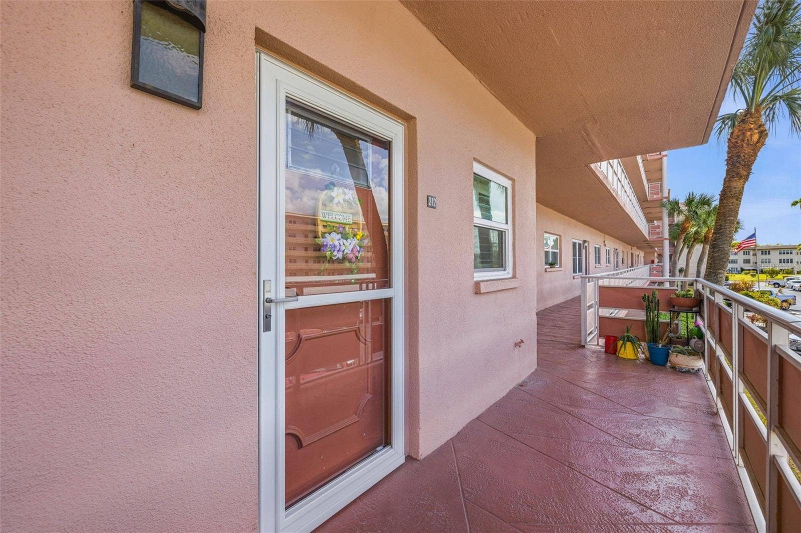 5521 80TH STREET N, #212, St Petersburg, FL 33709 Private entry walkway at Five Towns condo