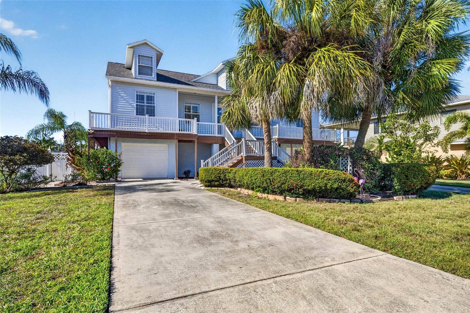 821 BLUE HERON BOULEVARD, Ruskin, FL 33570 Plenty of parking with dual driveways leading to dual tandem garage