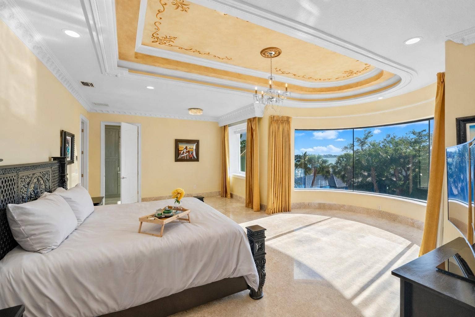 2000 PARK STREET N, St Petersburg, FL 33710 Bedroom 2 on the third level features a curved floor-to-ceiling window with endless views of the grounds and water.