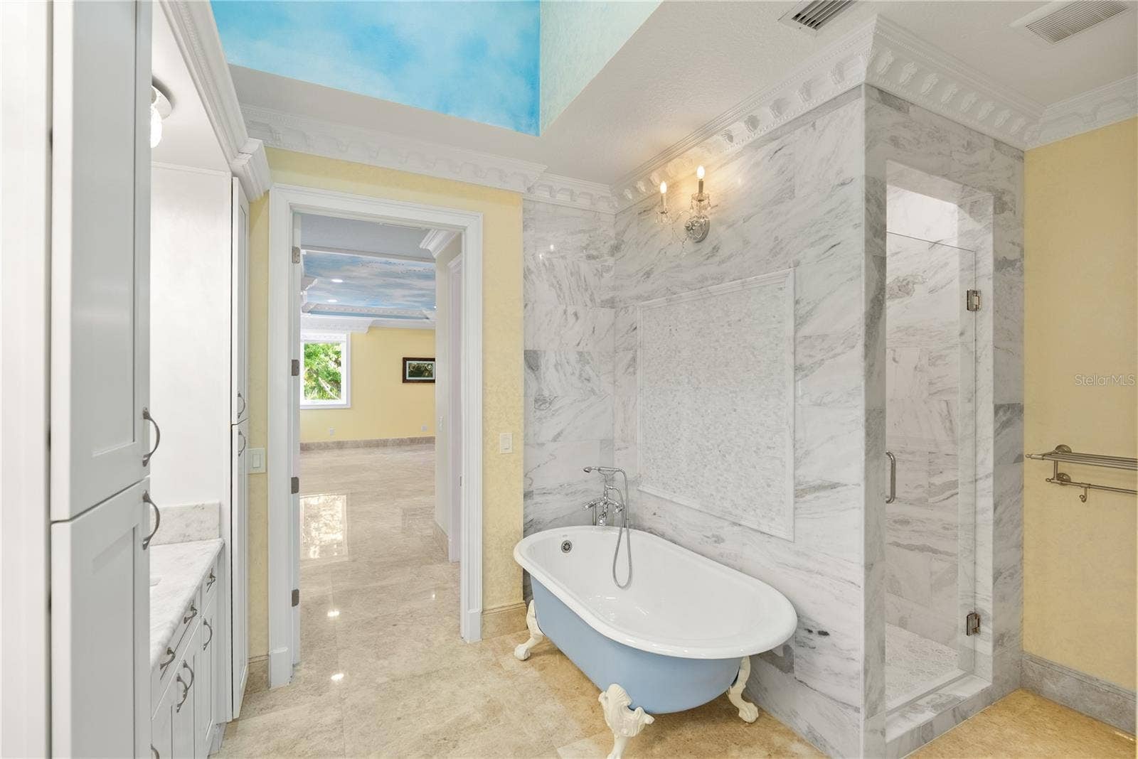 2000 PARK STREET N, St Petersburg, FL 33710 A timeless clawfoot soaking tub anchors this spa-inspired guest retreat.