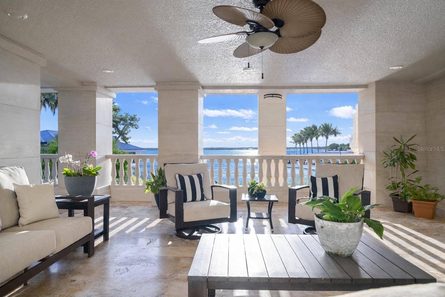 2000 PARK STREET N, St Petersburg, FL 33710 Covered terrace offering shade, breeze, and stunning water vistas.