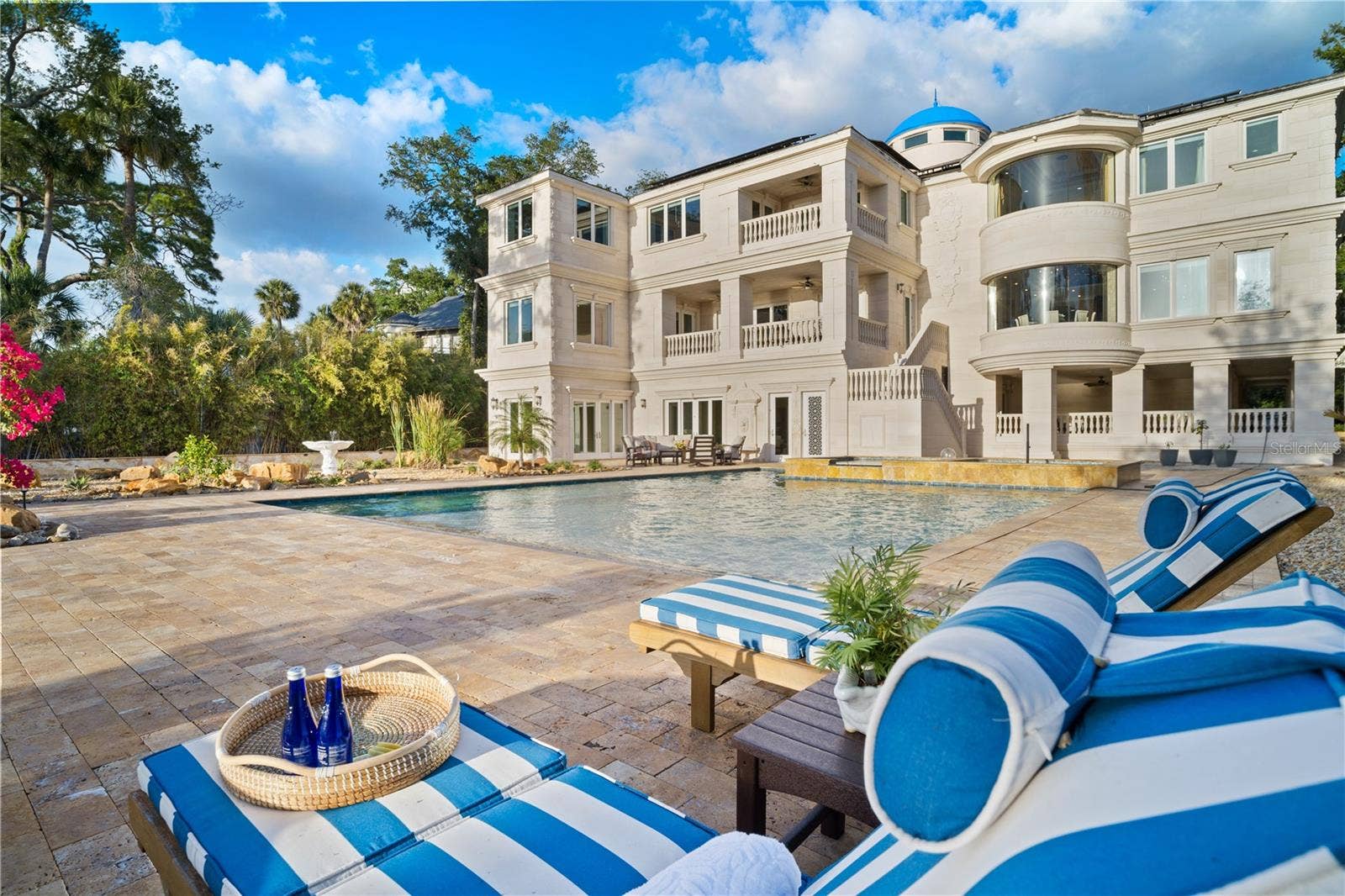2000 PARK STREET N, St Petersburg, FL 33710 Relax poolside on your expansive grounds, where resort-style living meets total privacy.