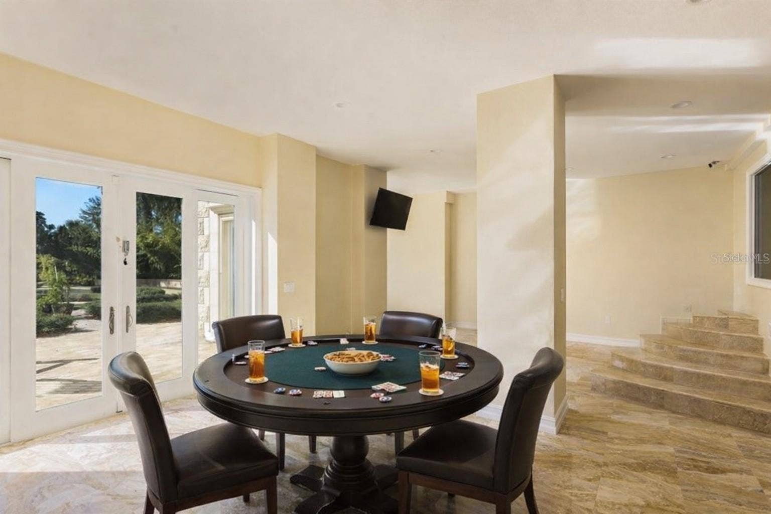 2000 PARK STREET N, St Petersburg, FL 33710 Versatile lower-level space ideal for entertaining or recreation.