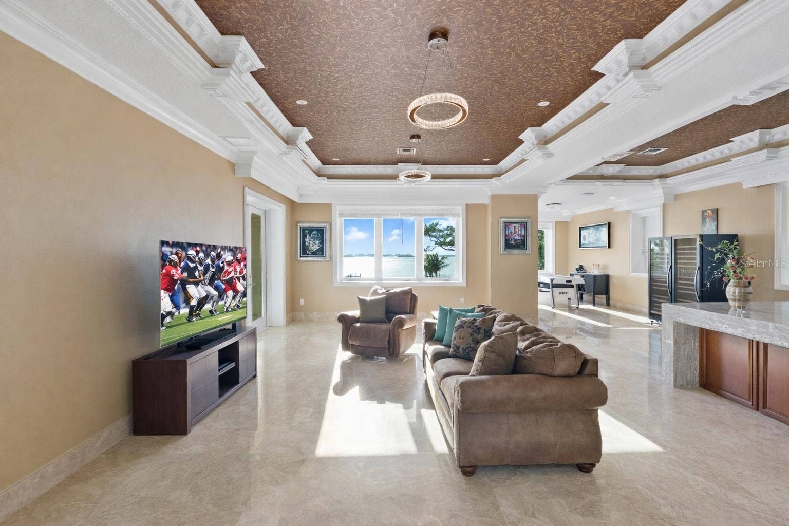 2000 PARK STREET N, St Petersburg, FL 33710 A statement space defined by dual coffered ceilings, offering endless possibilities for a game or entertainment lounge.