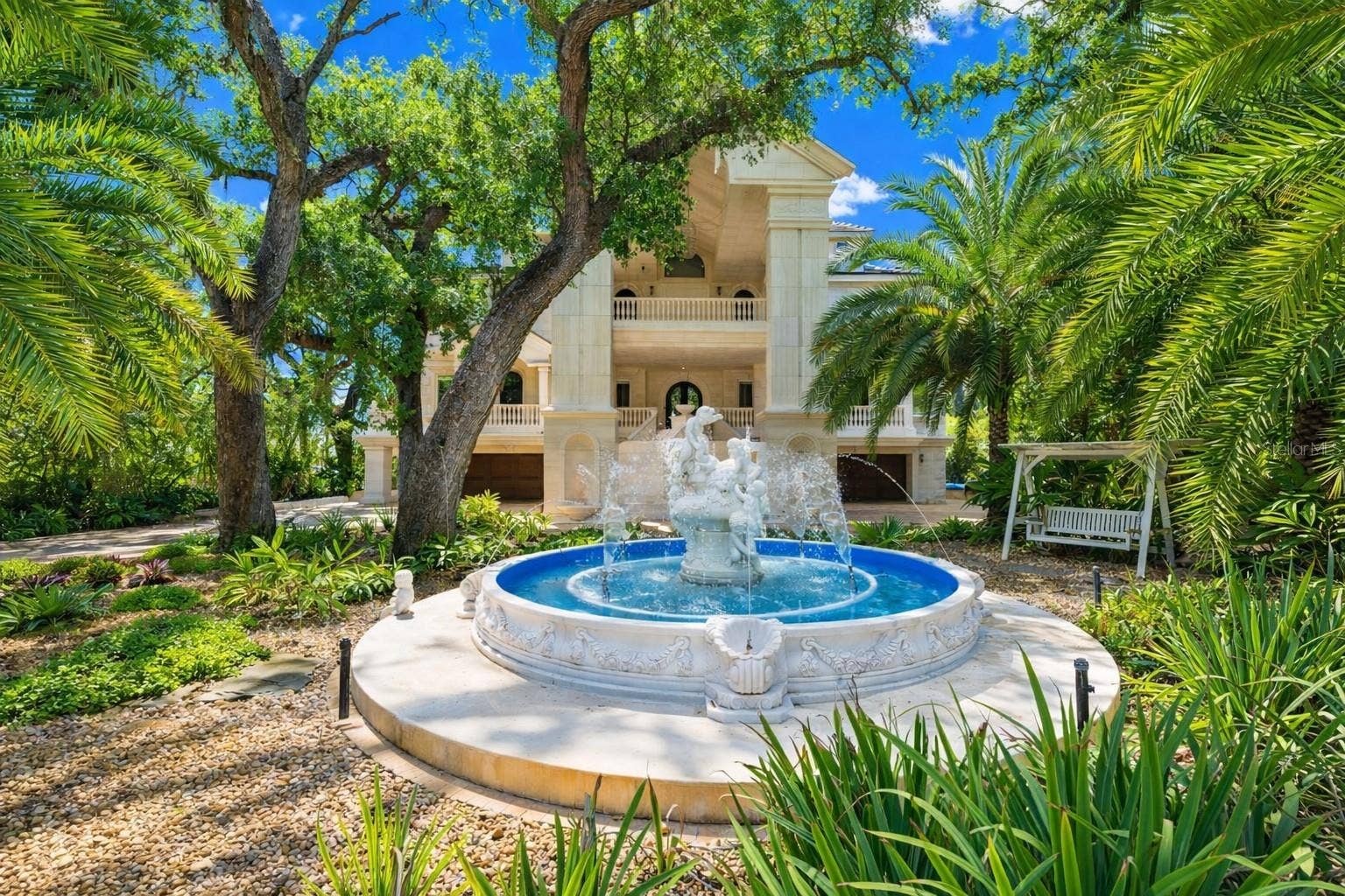 2000 PARK STREET N, St Petersburg, FL 33710 Gated estate entry with grand motor court and fountain arrival.