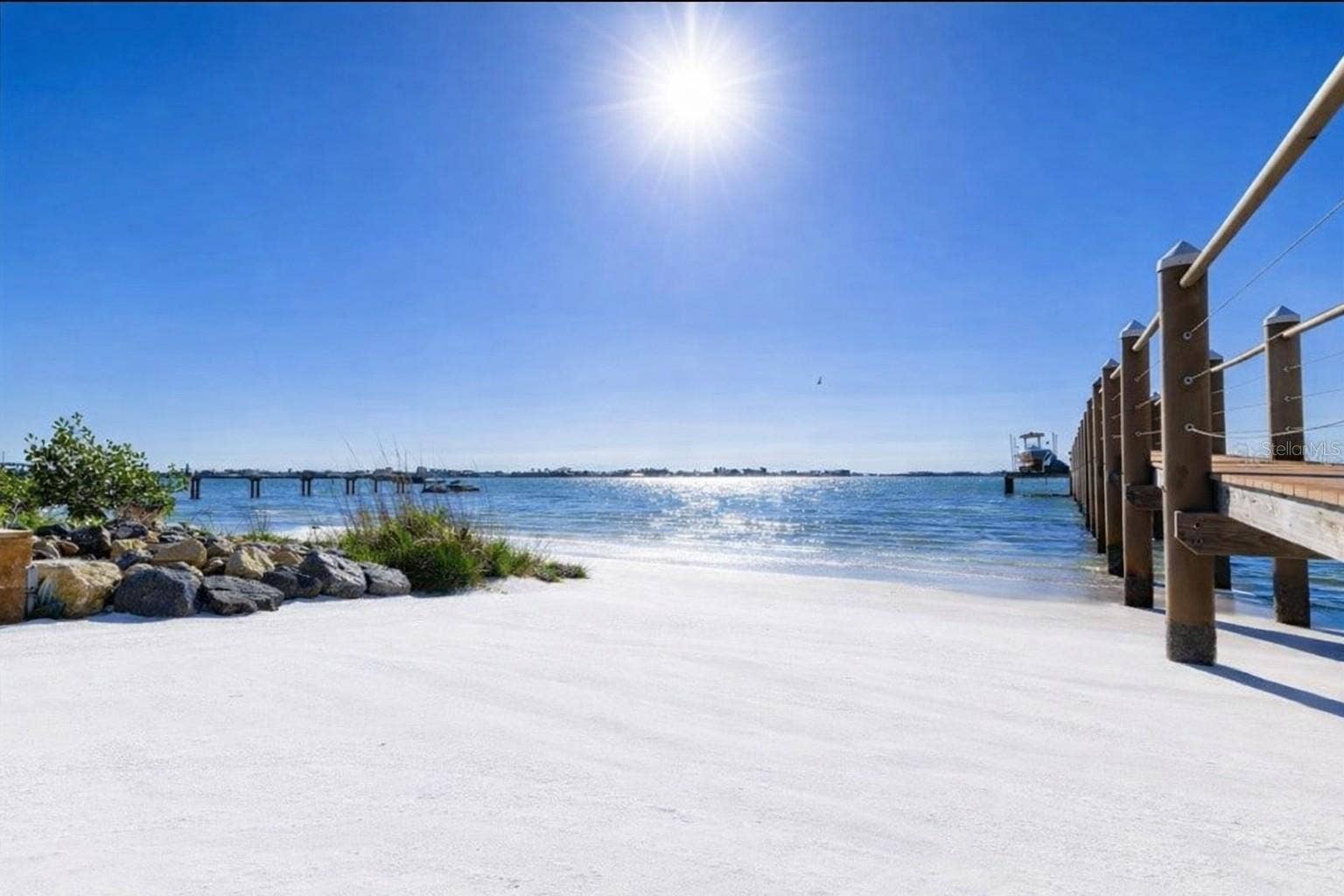 2000 PARK STREET N, St Petersburg, FL 33710 Private beach, no seawall. includes a 10,000-lb boat lift with a built in area for two Jet skis, wet slip for a yacht, and direct Gulf access.
