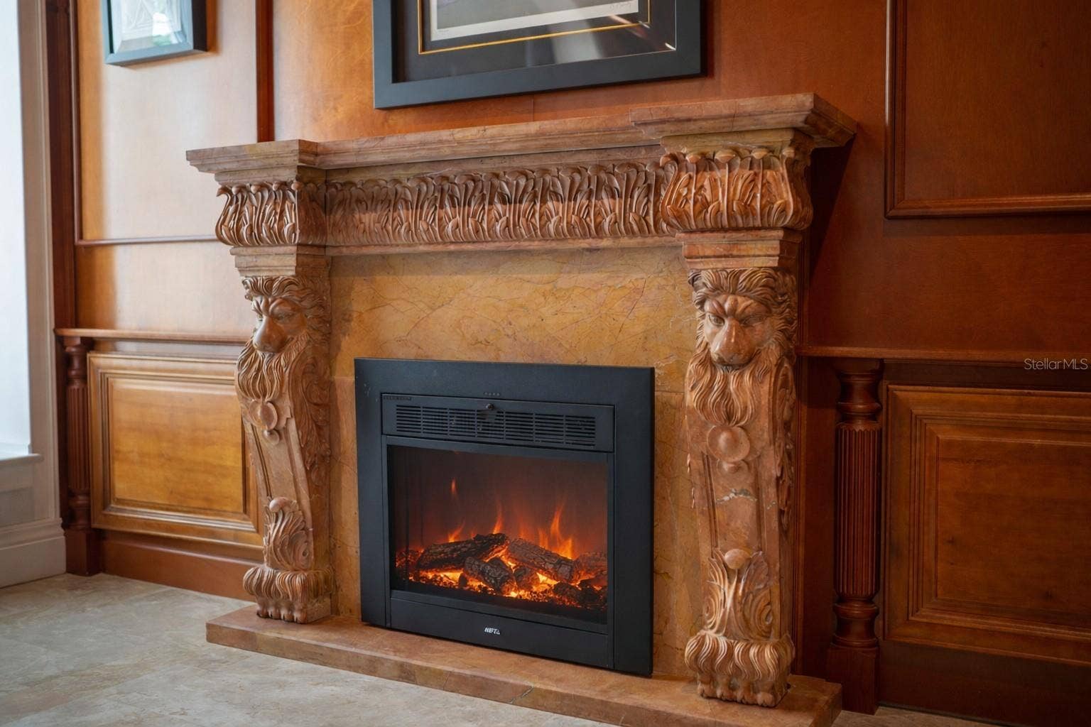 2000 PARK STREET N, St Petersburg, FL 33710 Elegant carved marble fireplace adds warmth and sophistication to this handsome study.