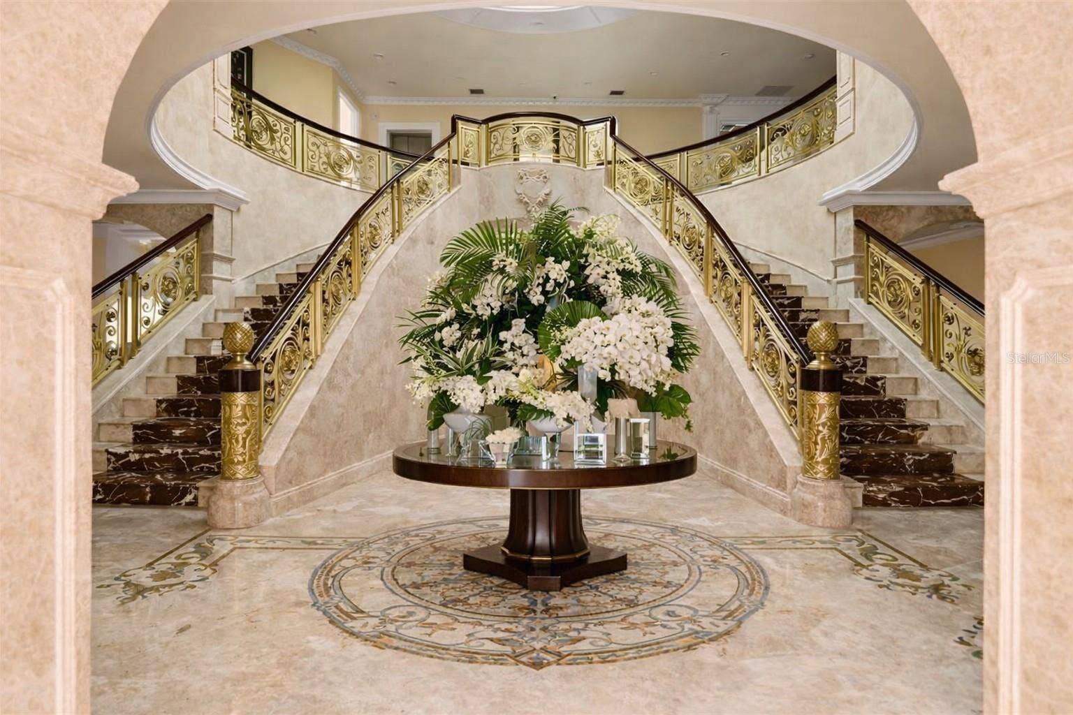 2000 PARK STREET N, St Petersburg, FL 33710 Dramatic rotunda with statement chandelier and marble staircases.