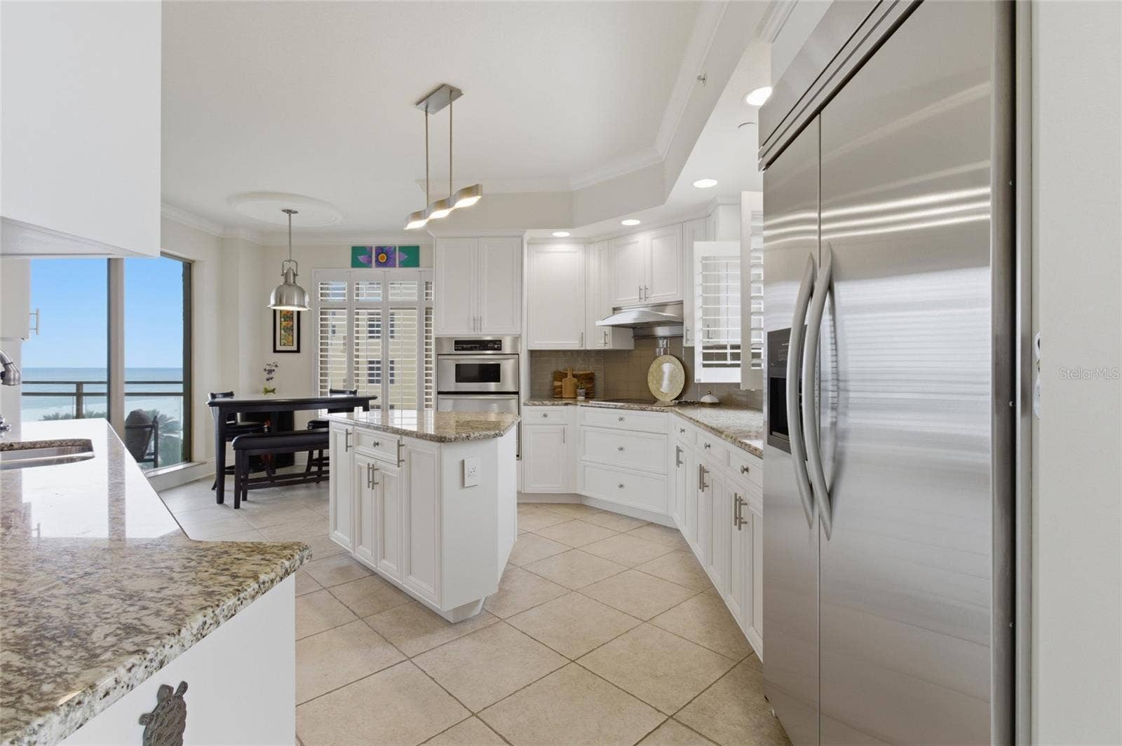 Walking from dining room to kitchen. Views on both the right and left!